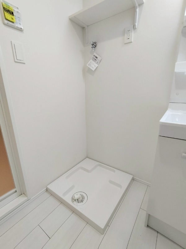 IL MEZZO DI TOKYO地下1階 洗濯機置場
