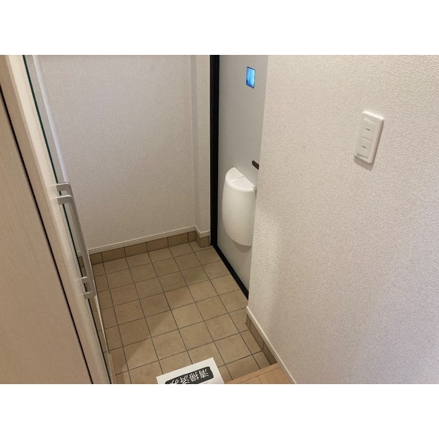 旭ヶ丘KOホームズ103号室 玄関