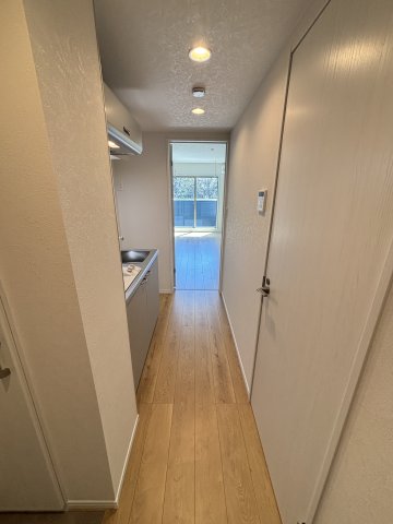 ウィンメゾン薬園台0103号室 玄関