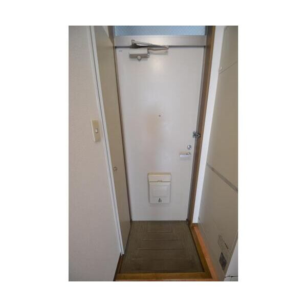 ハビタス調布101号室 玄関