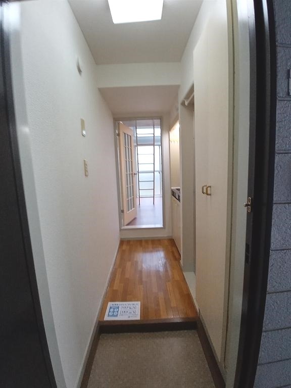 クロノス南大塚 玄関