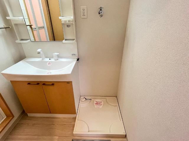 サンライズ戸田205号室 洗濯機置場