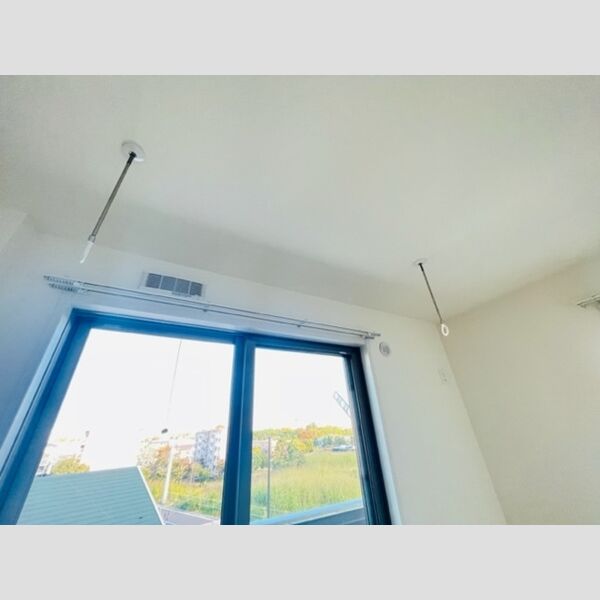 ルーフハウス　C203号室 室内物干し