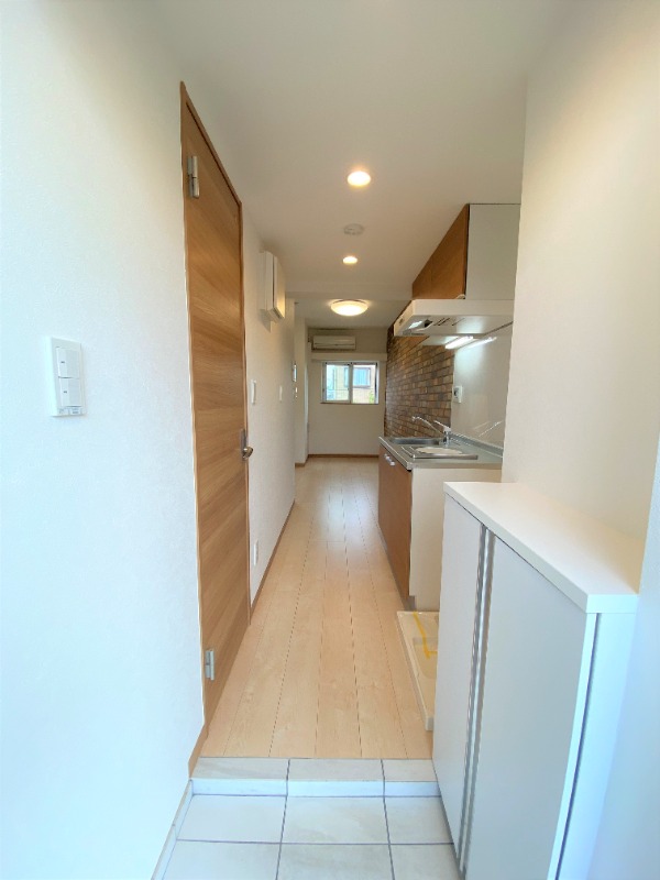 モアナコート北綾瀬3階 玄関