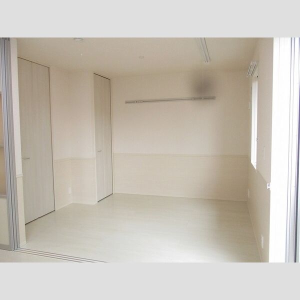 エトワールリビング201号室 洋室(リビング隣接)