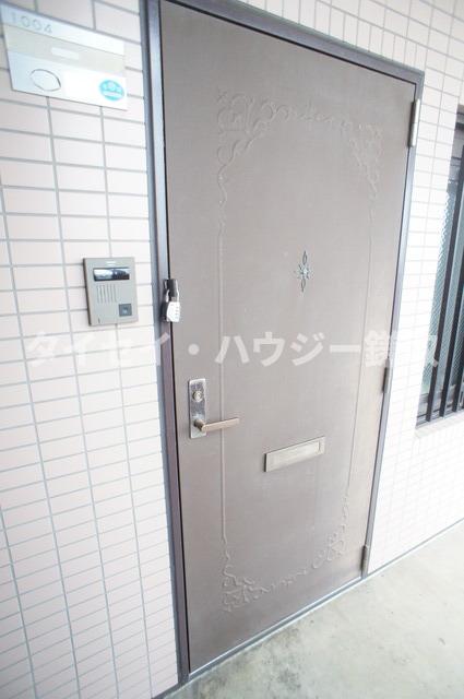 オーシャンビュー参番館1004号室 玄関
