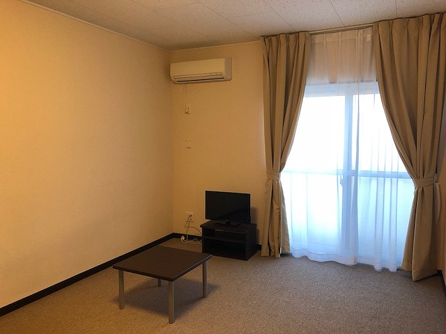 レオネクストカーサ川口飯塚 玄関