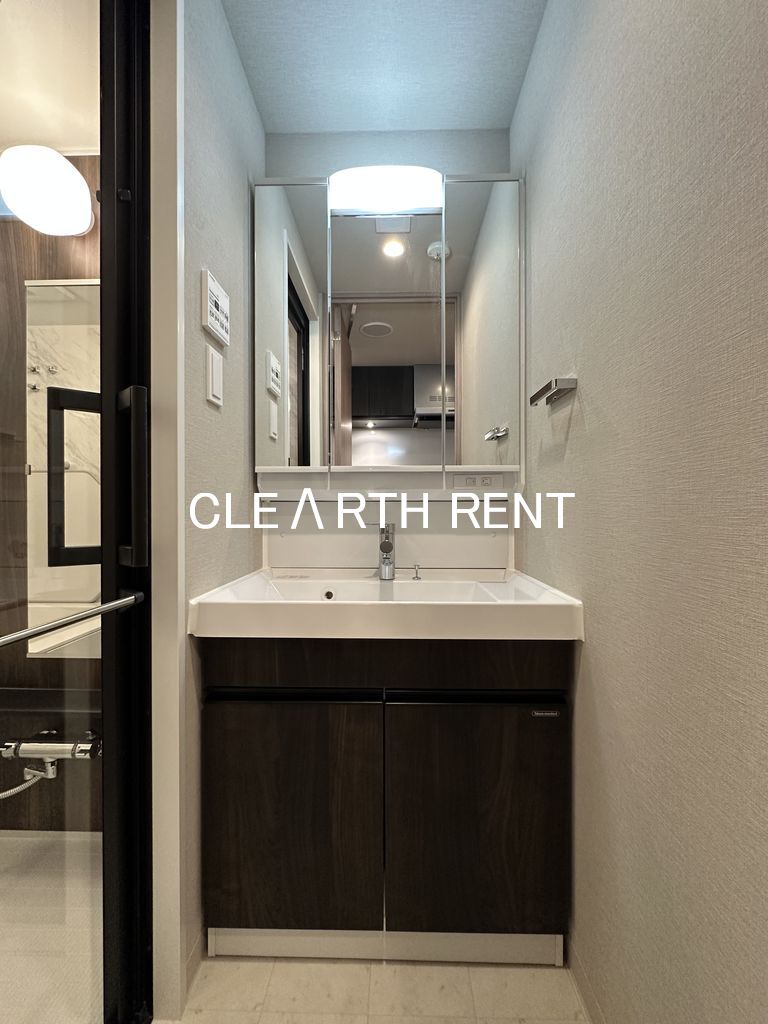 コンシェリア東京 ＜ＨＩＧＡＳＨＩＪＵＪＯ ＲＥＳＩＤＥＮＣＥ10階 人工大理石のカウンター一体型の洗面ボウル