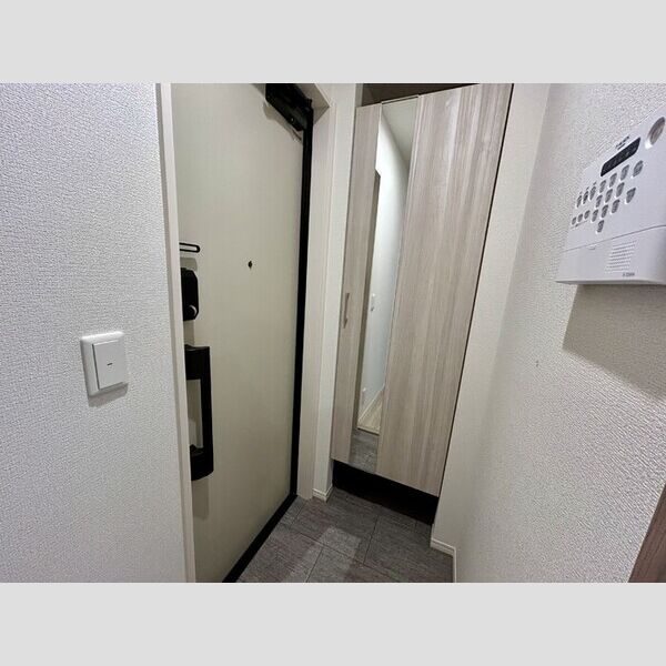 メゾンドール・カムイδ館 玄関