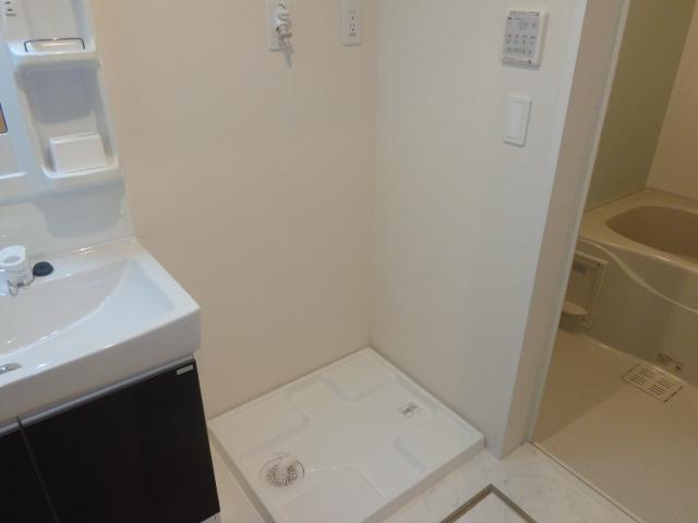 ルミウス103号室 洗濯機置場