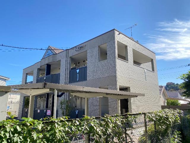 グランドロータス聖蹟202号室 外観写真（昼）