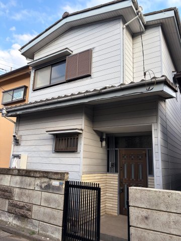 美住町戸建て 白いかわいいタイルの玄関