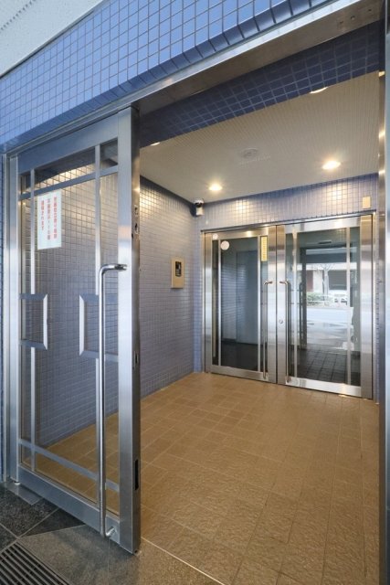 コナ・トルテック406号室 エントランス