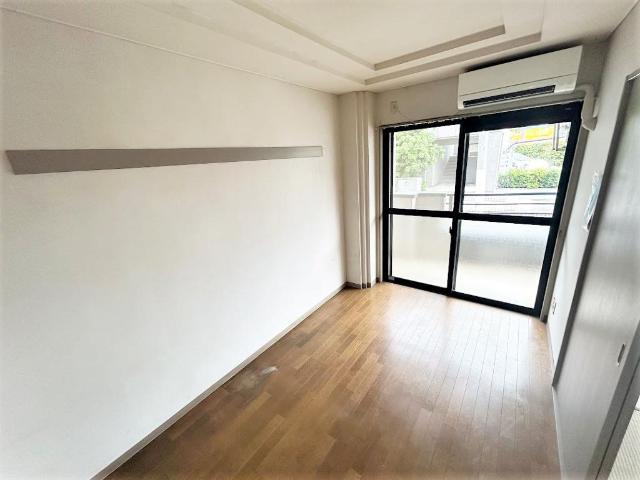 ガーデンスクエア102号室 洋室