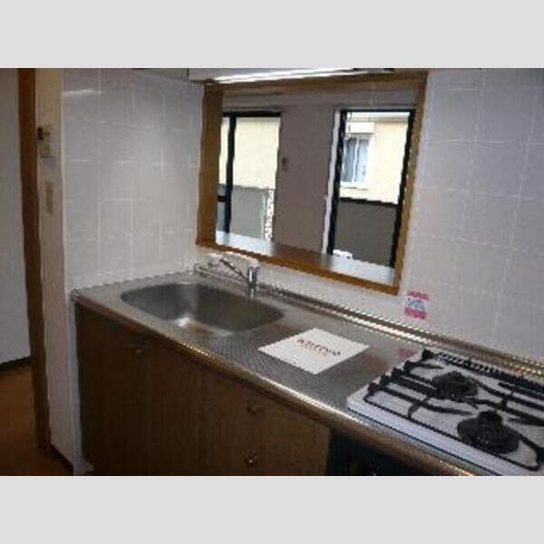 シーサイドスクウェア　弐番館303号室 対面式システムキッチン(2口ガスコンロ,グリル付)