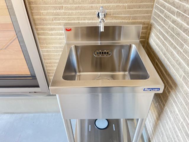 Ｇ・シエルクレール107号室 ガレージ内　水洗場