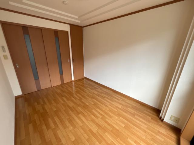 サンヒルズ201号室 洋室