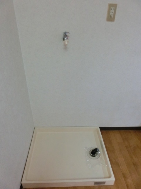 飯田マンション1階 室内洗濯機置場