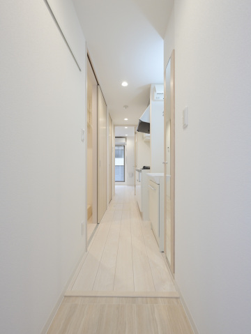 スカイルーチェ川口芝中田104号室 玄関