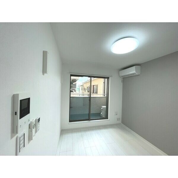 アンビシオン新田203号室 リビング