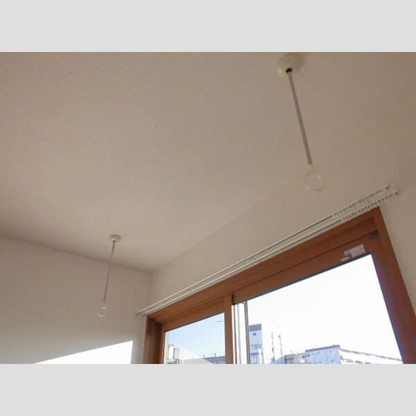 リブェール305号室 室内物干し