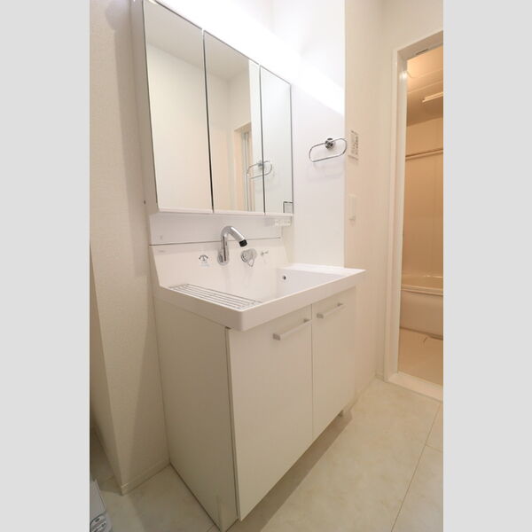 D-comodo深大寺北町101号室 洗面所