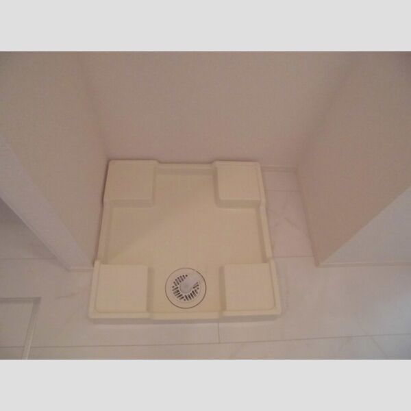 グランフォルト高砂101号室 室内洗濯機置場