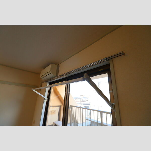 シュクレ川崎404号室 室内物干し