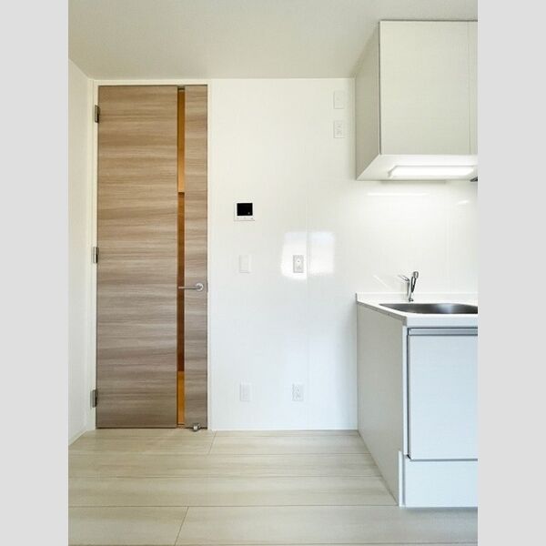 ルリアン江戸川203号室 冷蔵庫置場