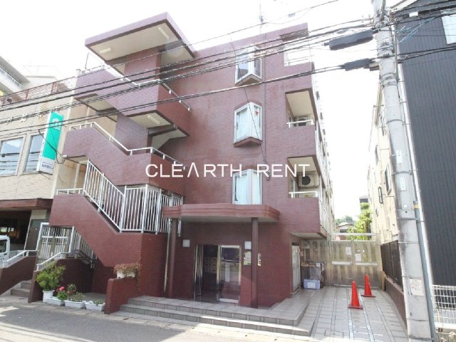 菱和パレス向ヶ丘遊園4階 タイル張りの外観