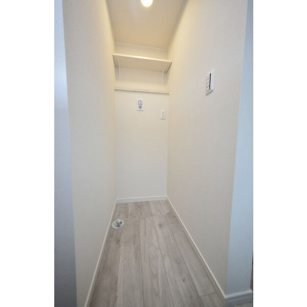 Heim　Komorelia0101号室 洗濯機置場