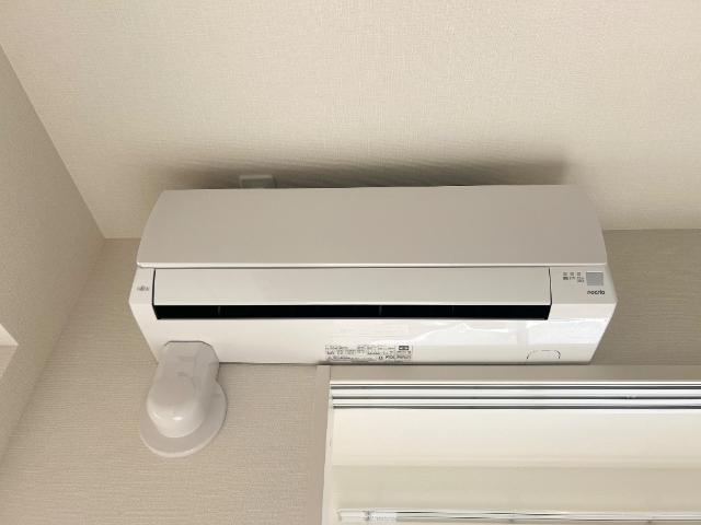Ｓｍｉｌｅ　ｖｉｌｌａ（スマイル　ヴィラ）203号室 エアコン