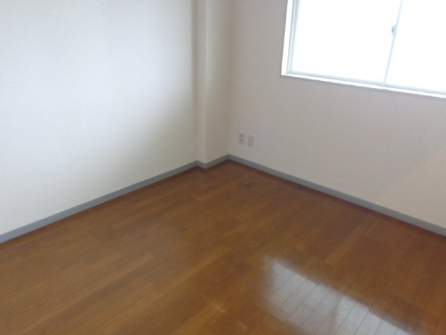 リバーサイドソシア 玄関側洋室