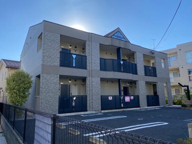 グランドロータス聖蹟202号室 外観写真（昼）