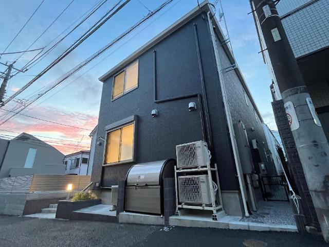 グラスコート明大前 外観写真（夜）