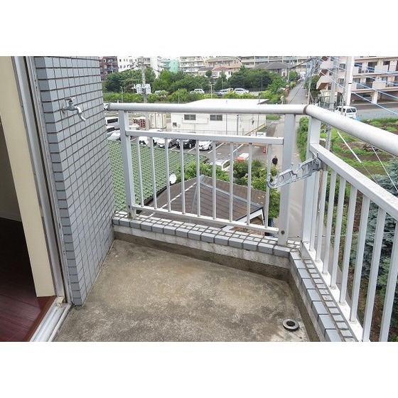 ドウェル砂川0401号室 室外洗濯機置き場