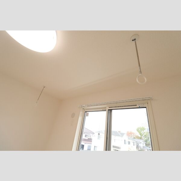 ホワイトハイツⅡ201号室 室内物干し