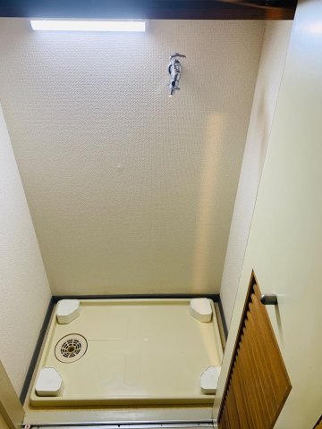 ミリオンコート神楽坂 室内洗濯機置き場（扉の中に収納できます）