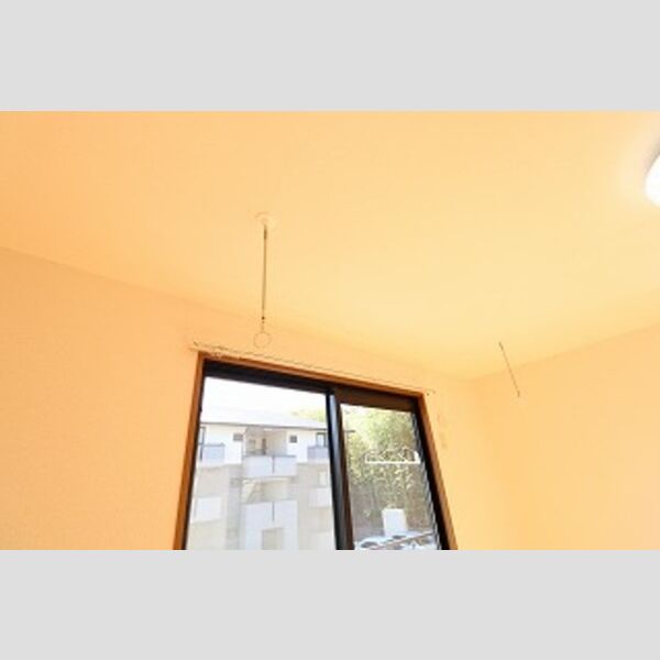 トリニシティ　弐番館202号室 室内物干し