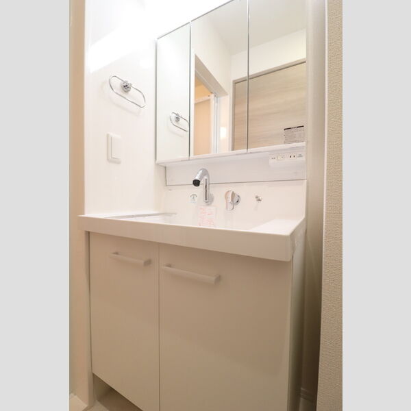 D-comodo深大寺北町102号室 洗面所