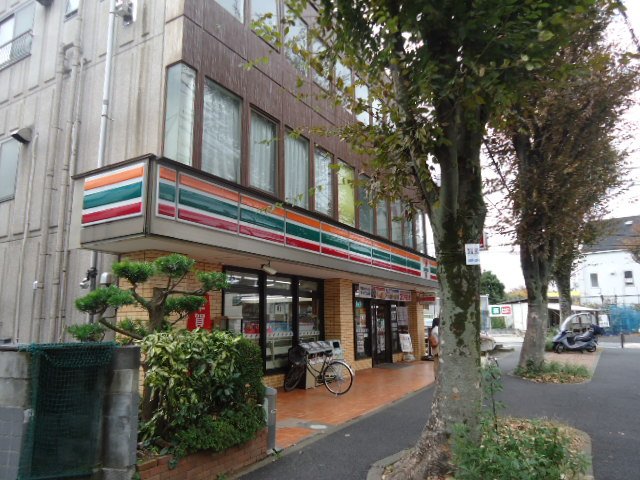 ピノコート セブンイレブン稲城市平尾店まで503ｍ