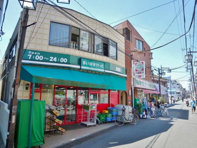 グラテース 【デパート】まいばすけっと北谷町店まで299ｍ