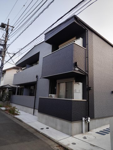 Charites三鷹103号室 2025年築・落ち着いた外観と高級感あるタイル仕上