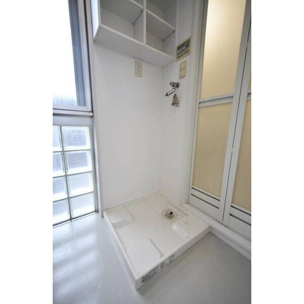 クラウンズコート羽沢0201号室 洗濯機置場