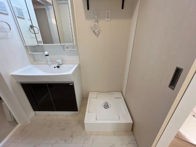 レヴメゾン神山弐番館201号室 洗濯機置場