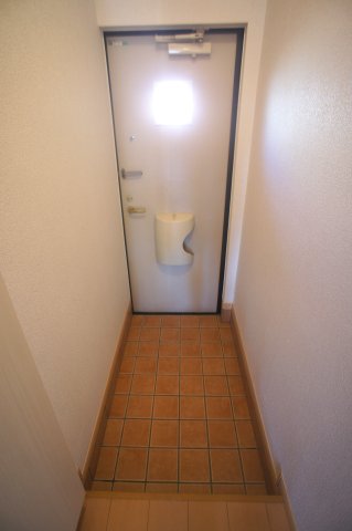 スプリングコート 玄関