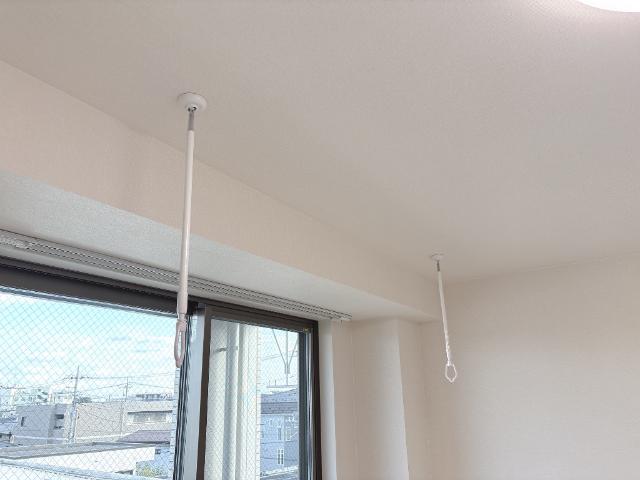 Luminous coat306号室 室内物干