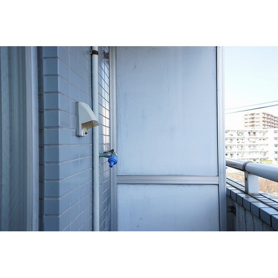 ドウェル砂川0403号室 室外洗濯機置き場