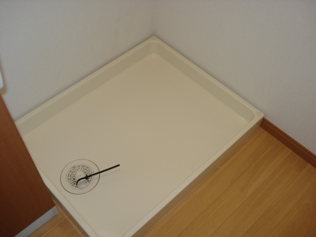 ドミール・ソレイユ101号室 洗濯機置場