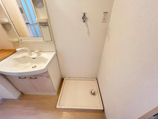 ＥＴＯＩＬＥｍａｅｋａｗａ（エトワール前川）205号室 洗濯機置場